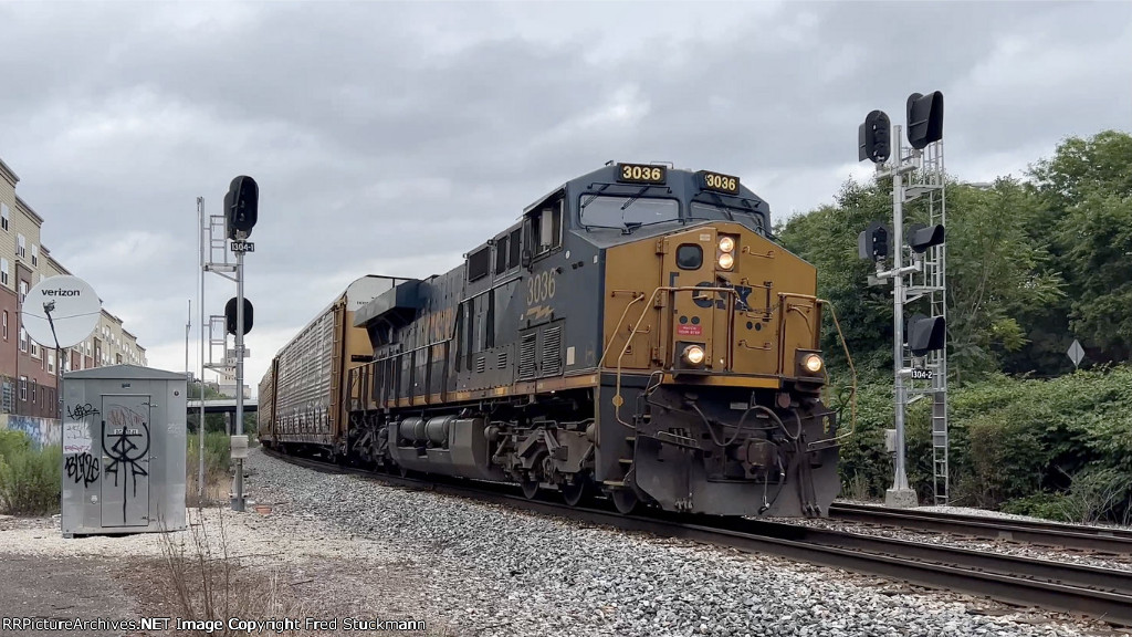 CSX 3036 leads M217 west.